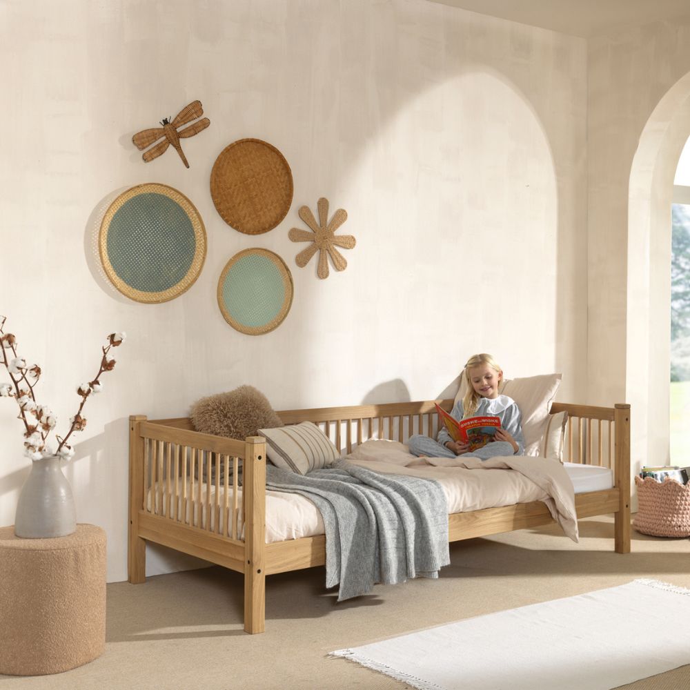 The Forrest Oak Kids Cabin Bed with Safety Rail features a safety rail for added protection and a natural finish with strong oak material