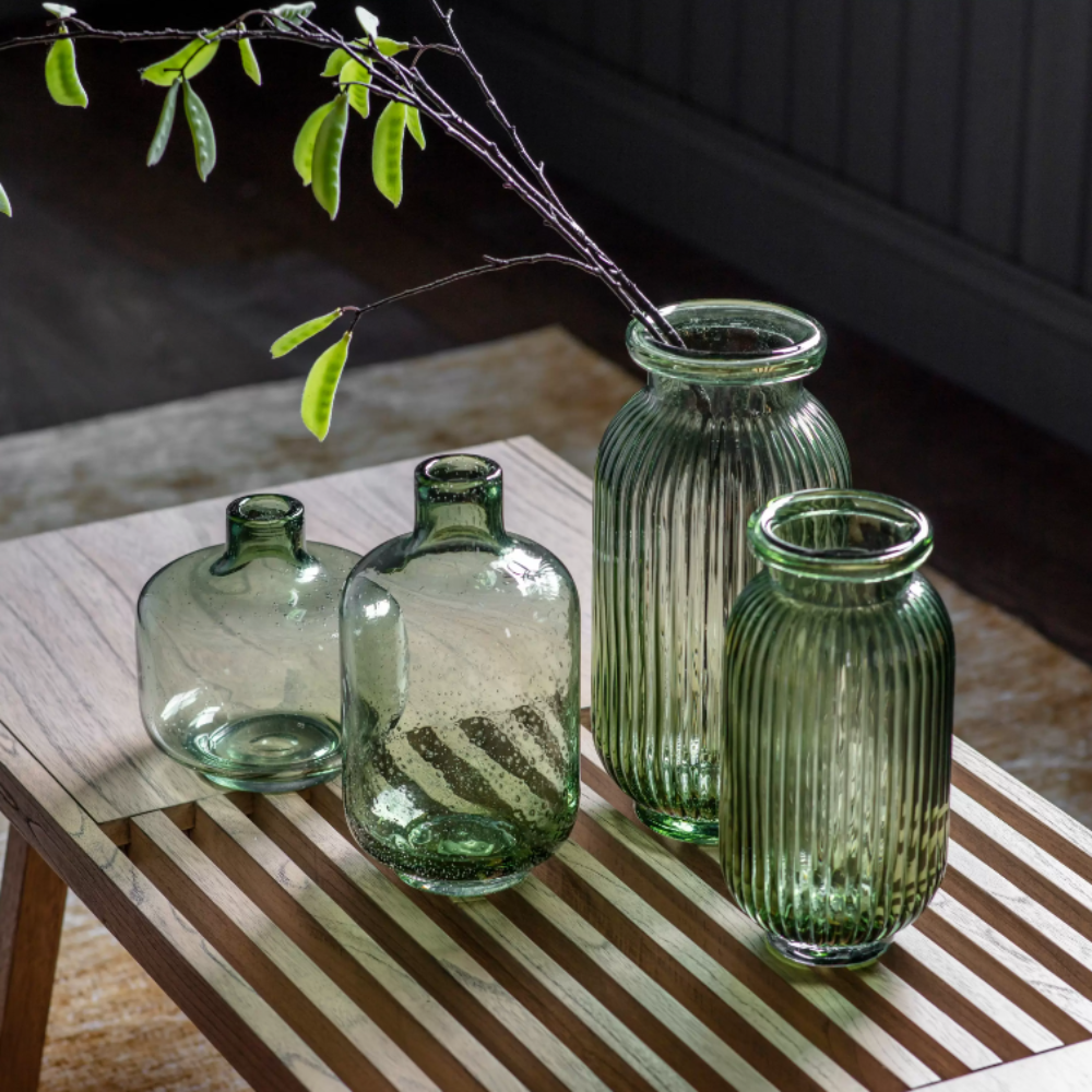 The Gallery Francia Large Vase in Green offers a ribbed texture and stylish shape, adding elegance and beauty to any room.