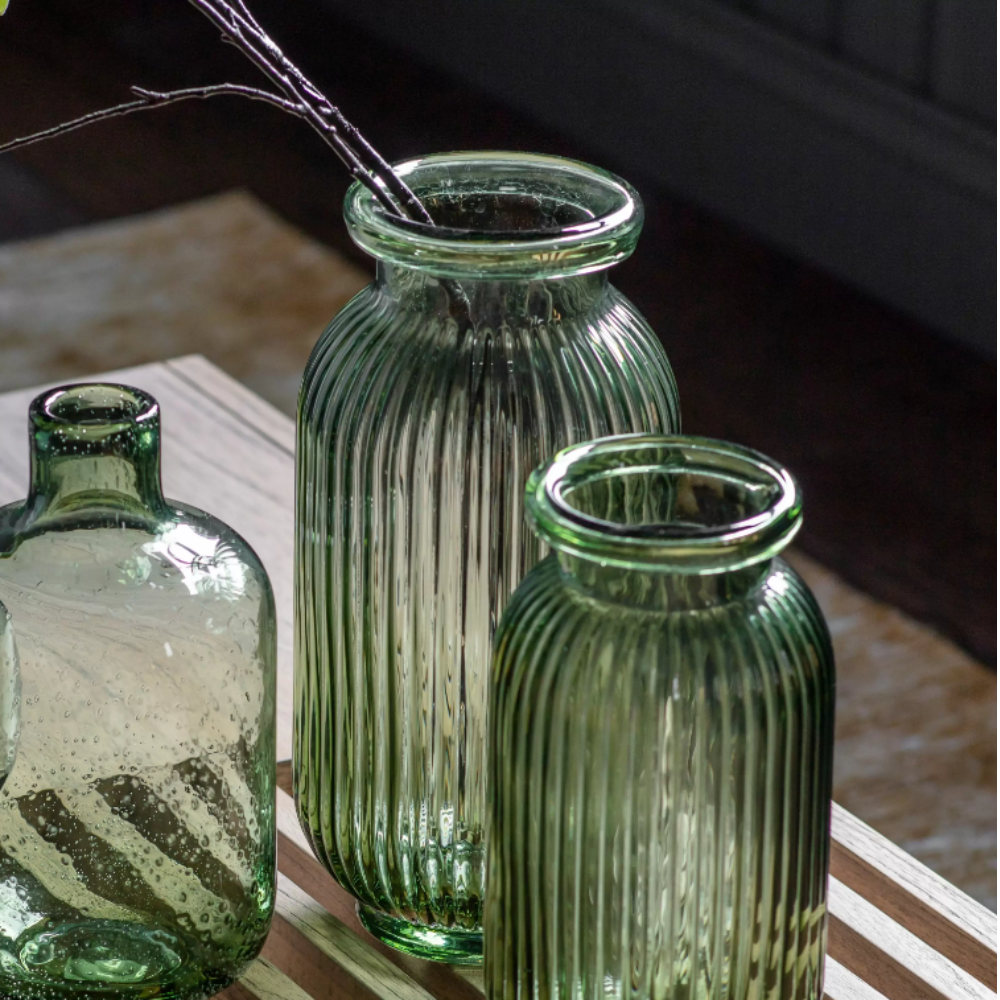 The Gallery Francia Large Vase in Green offers a ribbed texture and stylish shape, adding elegance and beauty to any room.