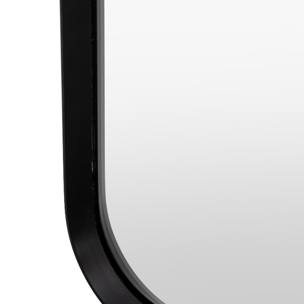 The Gallery Holworth Leaner Mirror in Black offers a sleek frame and full-length design, perfect for any modern or classic space.