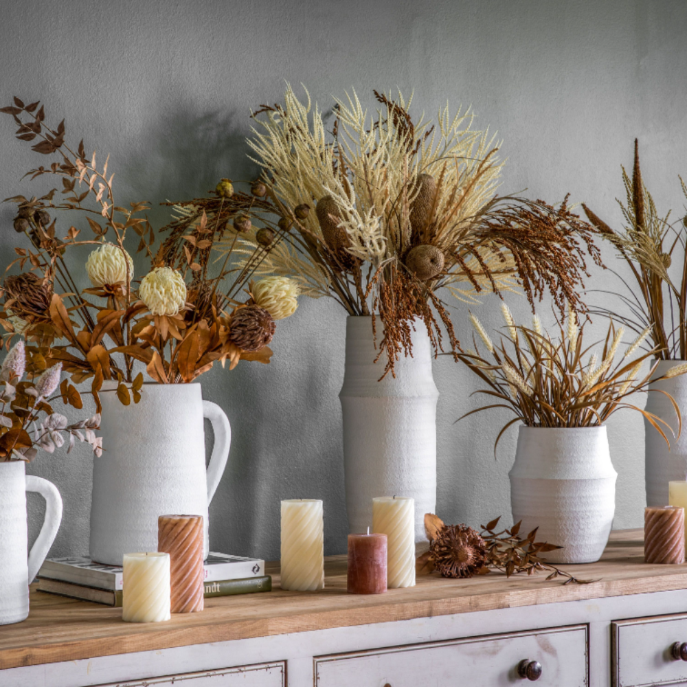 The Gallery Larson Medium Vase in White offers a matte finish, ideal for displaying flowers or an accent piece.
