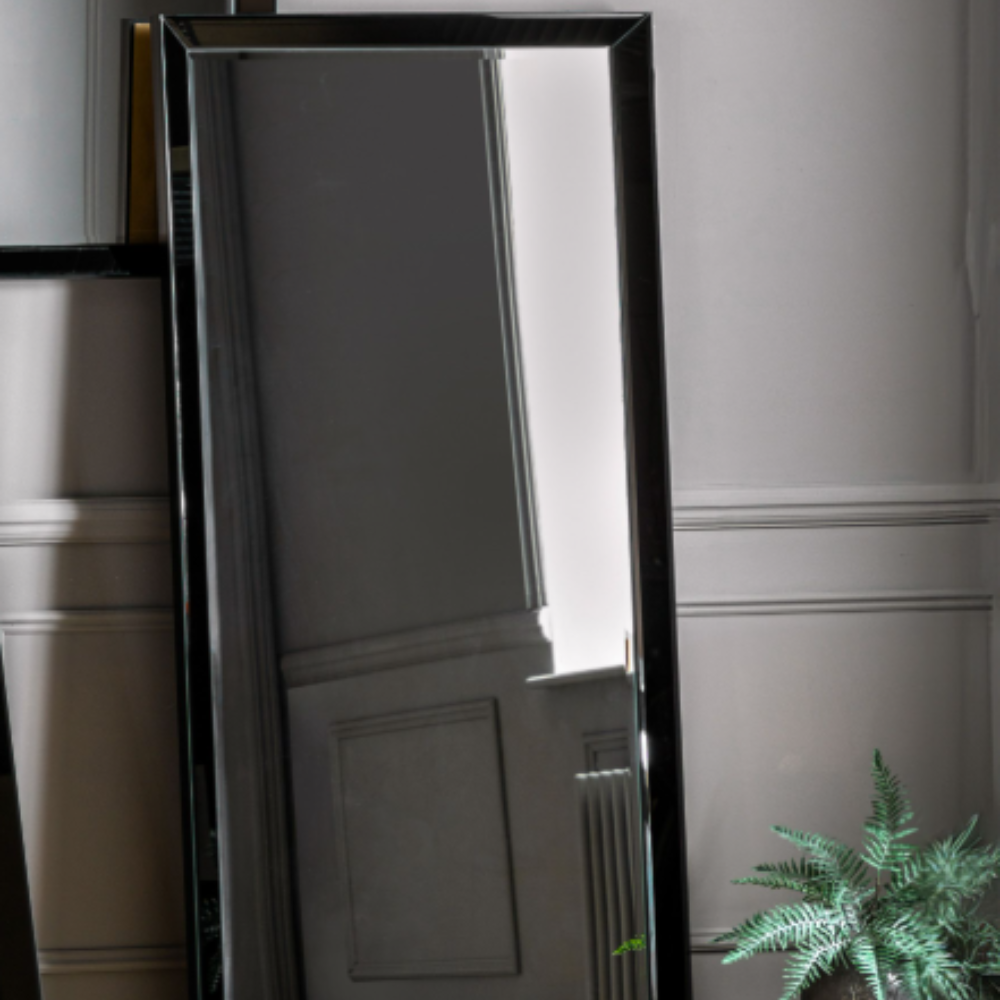 The Gallery Luna Large Mirror in Black features bevelled glass, angled frame, large versatile hanging or leaning options