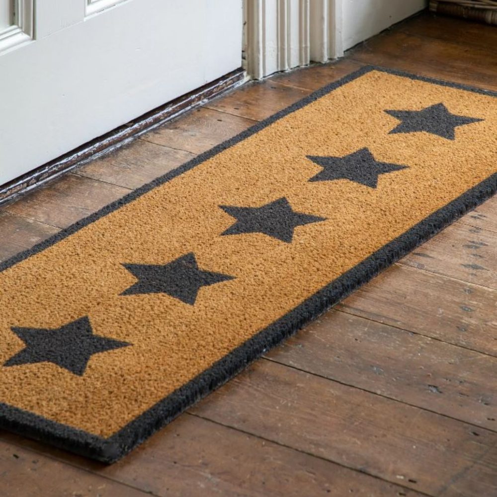The Gallery Star Coir Double Doormat is extra-wide for double doors, durable coir traps dirt, with non-slip backing.