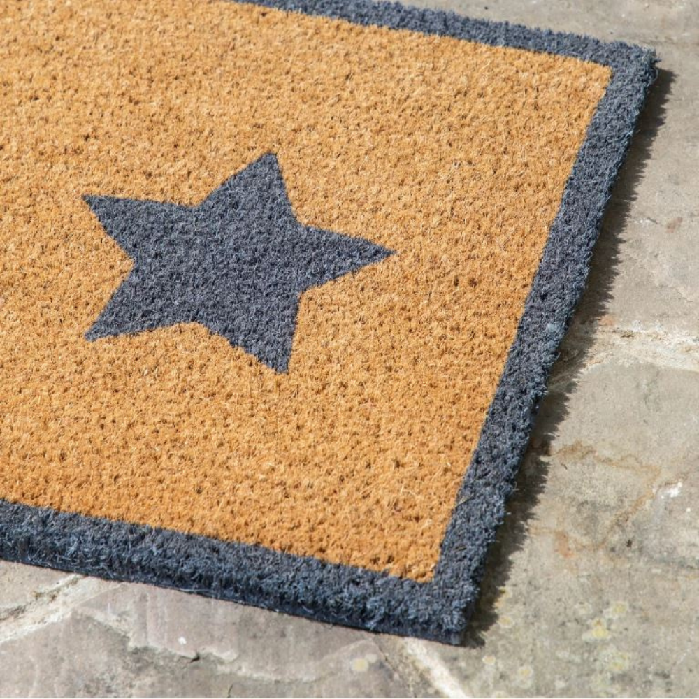 The Gallery Star Coir Double Doormat is extra-wide for double doors, durable coir traps dirt, with non-slip backing.