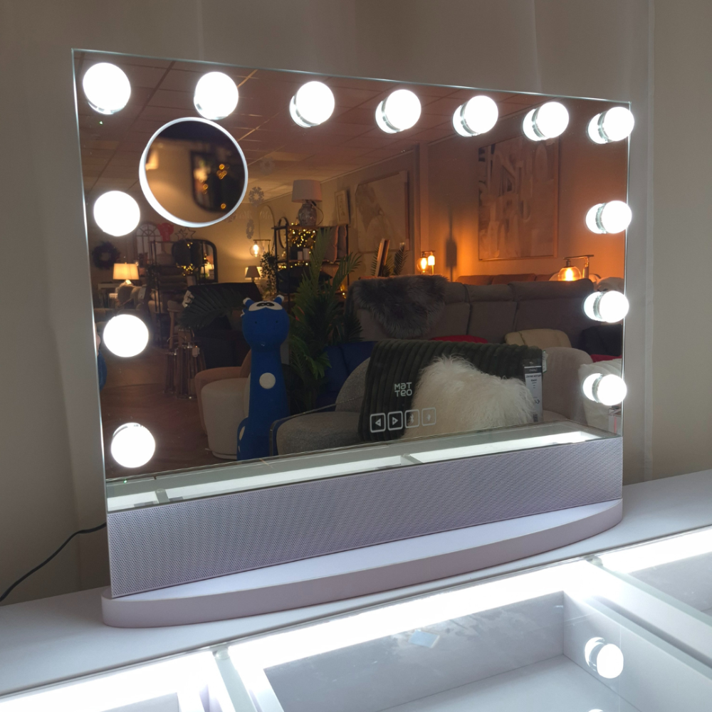The Glamour 13 Hollywood Mirror features 3 colour lighting, Bluetooth speaker, USB port & detachable base, ideal vanity mirror for lighting and convenience