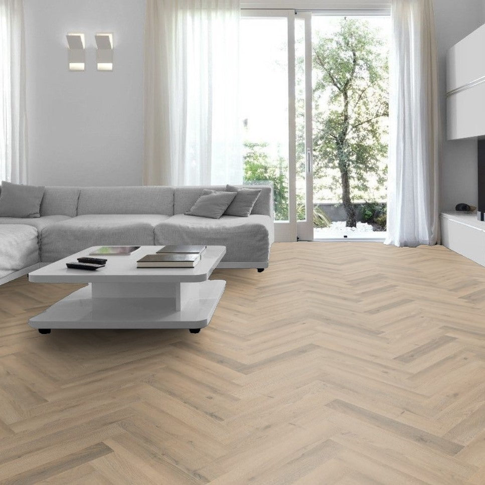 Greige Oak Herringbone Laminate Flooring 12mm: AC4-rated, durable, click-lock installation, suitable for commercial and residential spaces. Timeless herringbone design.