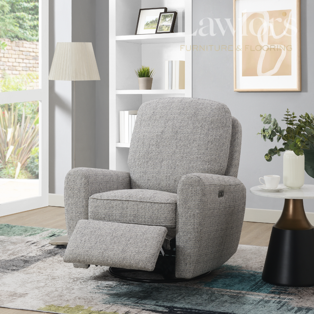 Stone grey electric recliner chair in a living room setting with decor elements.