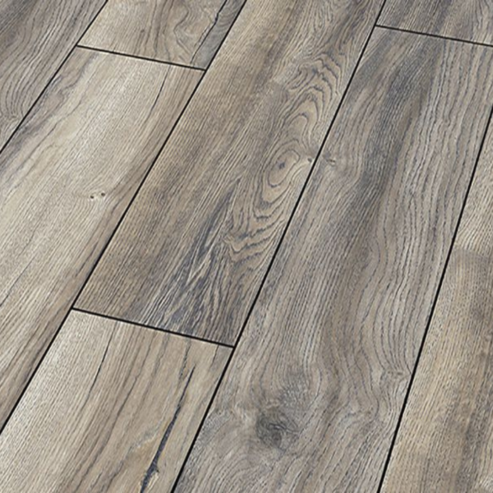 The Harbour Oak Grey Laminate Flooring - 12mm features durable AC5 rating, 5G Click System and underfloor heating compatible.