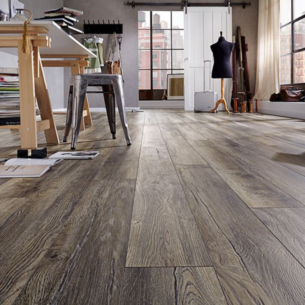 The Harbour Oak Grey Laminate Flooring - 12mm features durable AC5 rating, 5G Click System and underfloor heating compatible.