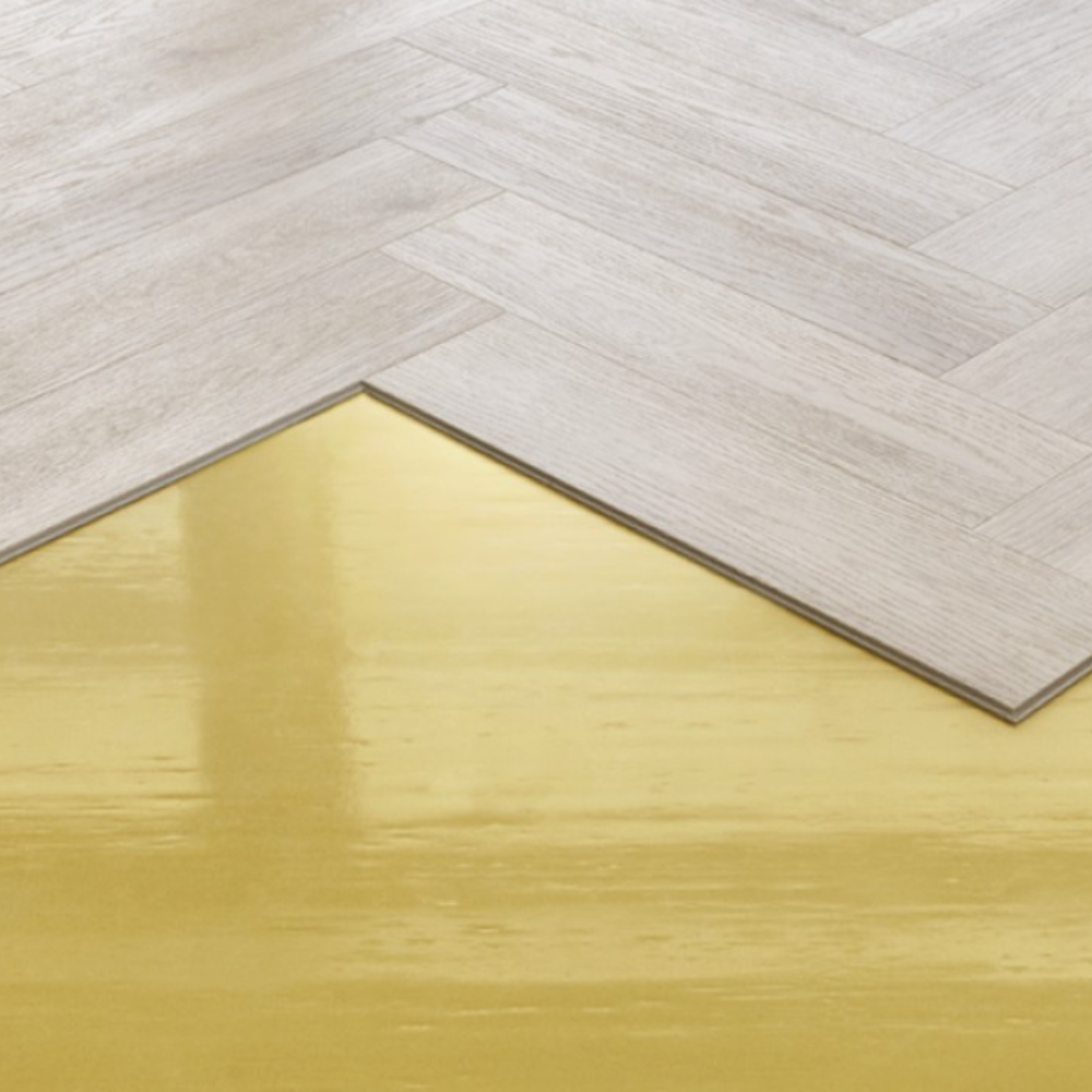 The Harlow Oak Herringbone SPC Flooring features a timeless oak design, suitable for underfloor heating, Titanium Nano finish and a 25 year warranty