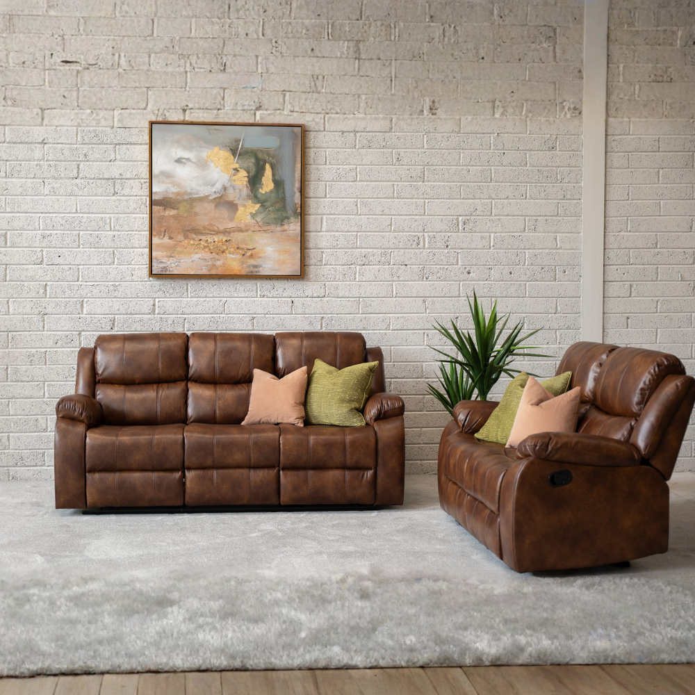 Add some style with the Jasper Recliner Sofa in Tan featuring plush cushioning, smooth recline and timeless design make it perfect for any living space