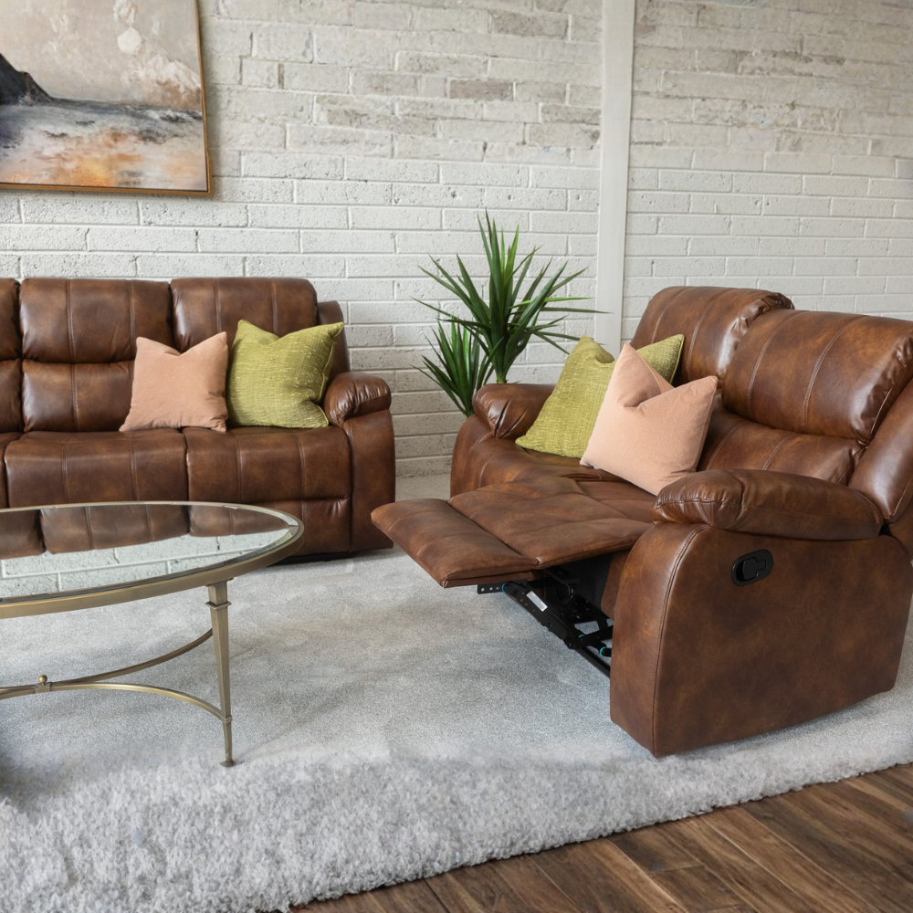 Add some style with the Jasper Recliner Sofa in Tan featuring plush cushioning, smooth recline and timeless design make it perfect for any living space