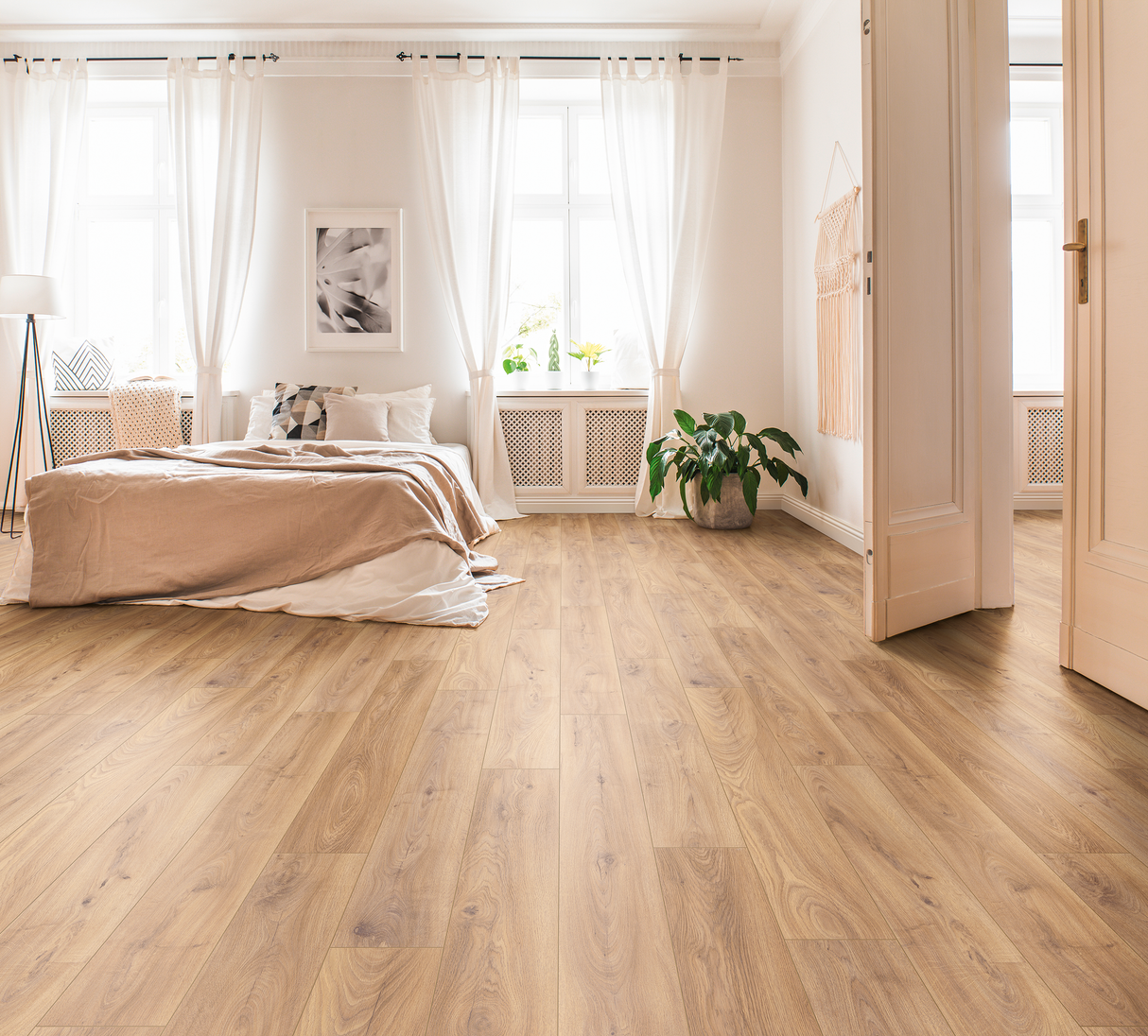 Donard Oak Laminate Flooring - 8mm, AC4 wear rating, R10 anti-slip, Click2go Locking System, 20-year guarantee, realistic wood look, perfect for heavy domestic and commercial use.