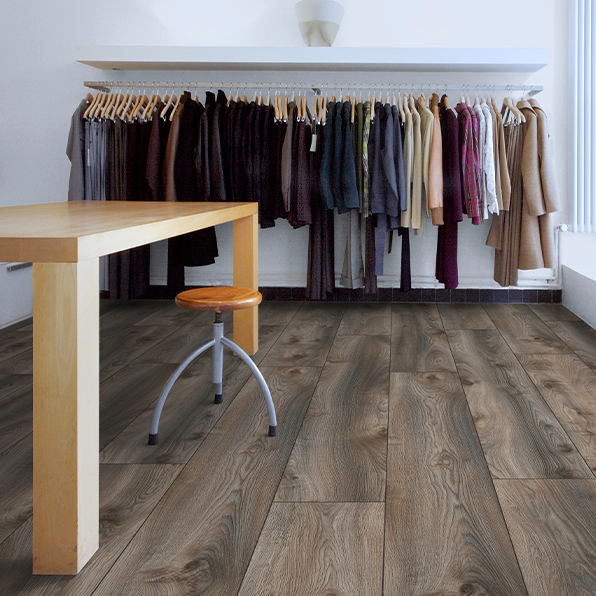 The Macro Oak Grey Laminate Flooring 12mm features AC5 durability, 5G click system, long planks and a modern oak finish.