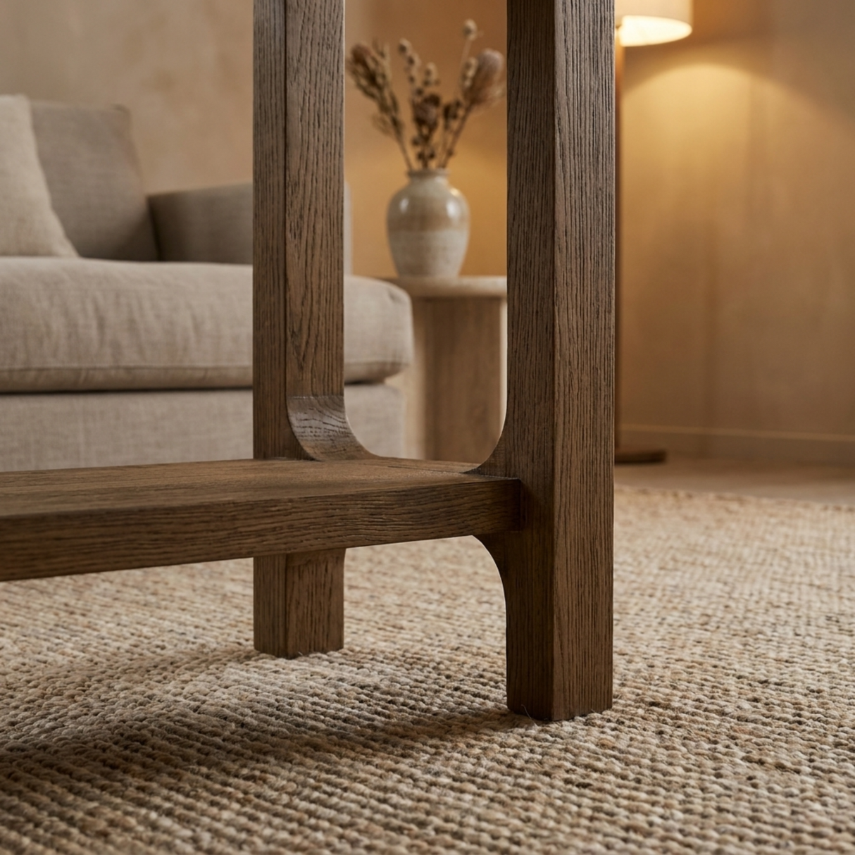 Wooden console table in a living room setting with a blurred background