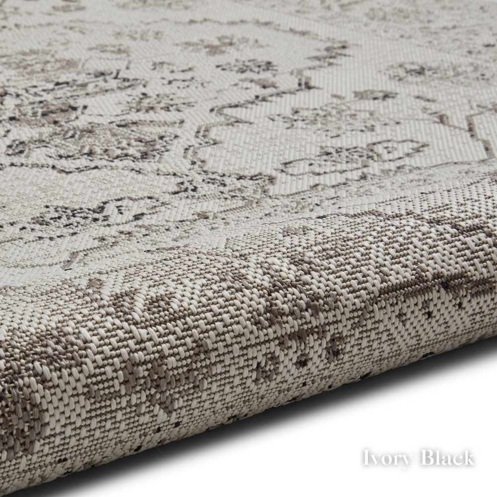 For your indoor or outdoor spaces the Miami Indoor/Outdoor Machine Made Rugs feature styles in vintage or botanical designs and durable polypropylene