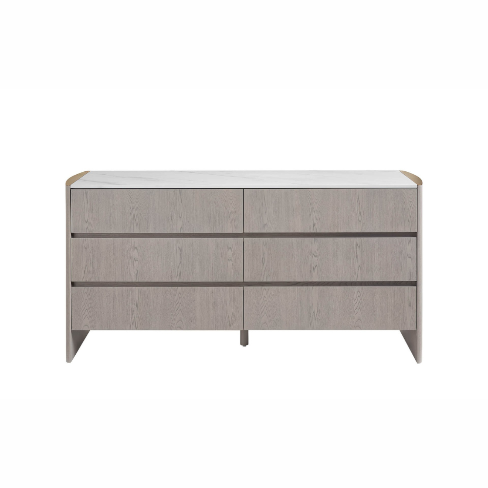 The Mondello 6 Drawer Chest in Washed Oak features a durable sintered stone top, luxurious detailing and 6 spacious drawers for style and functionality