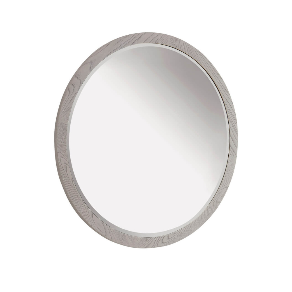 The Mondello Round Mirror in Washed Oak features a sleek frame and a tempered glass, perfect for pairing with furniture or as a standalone accent