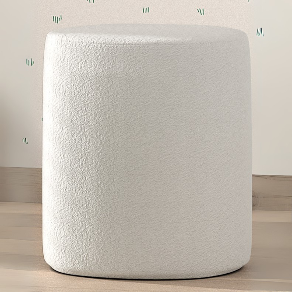 The Moon Kids Stool in Boucle is available in pink, white, grey and olive green, soft upholstery, multifunctional design and Belgian style