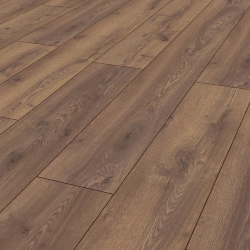 The Mountain Oak Brown Laminate Flooring - 10mm features AC5 heavy-duty, realistic oak texture and rich chocolate tones.