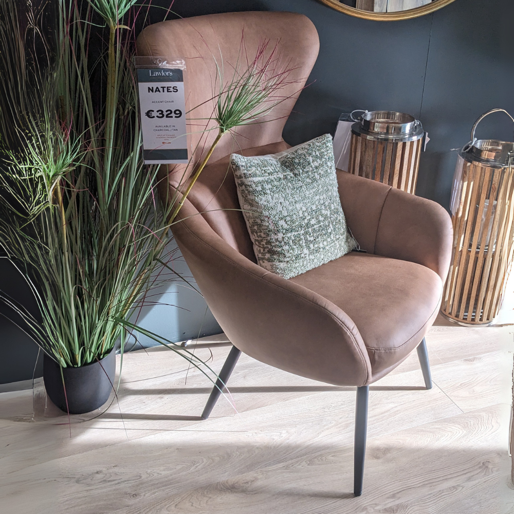 The Nates Accent Chair in Tan features durable fabric, sink in comfort and a compact stylish design, a versatile piece to elevate any modern living space