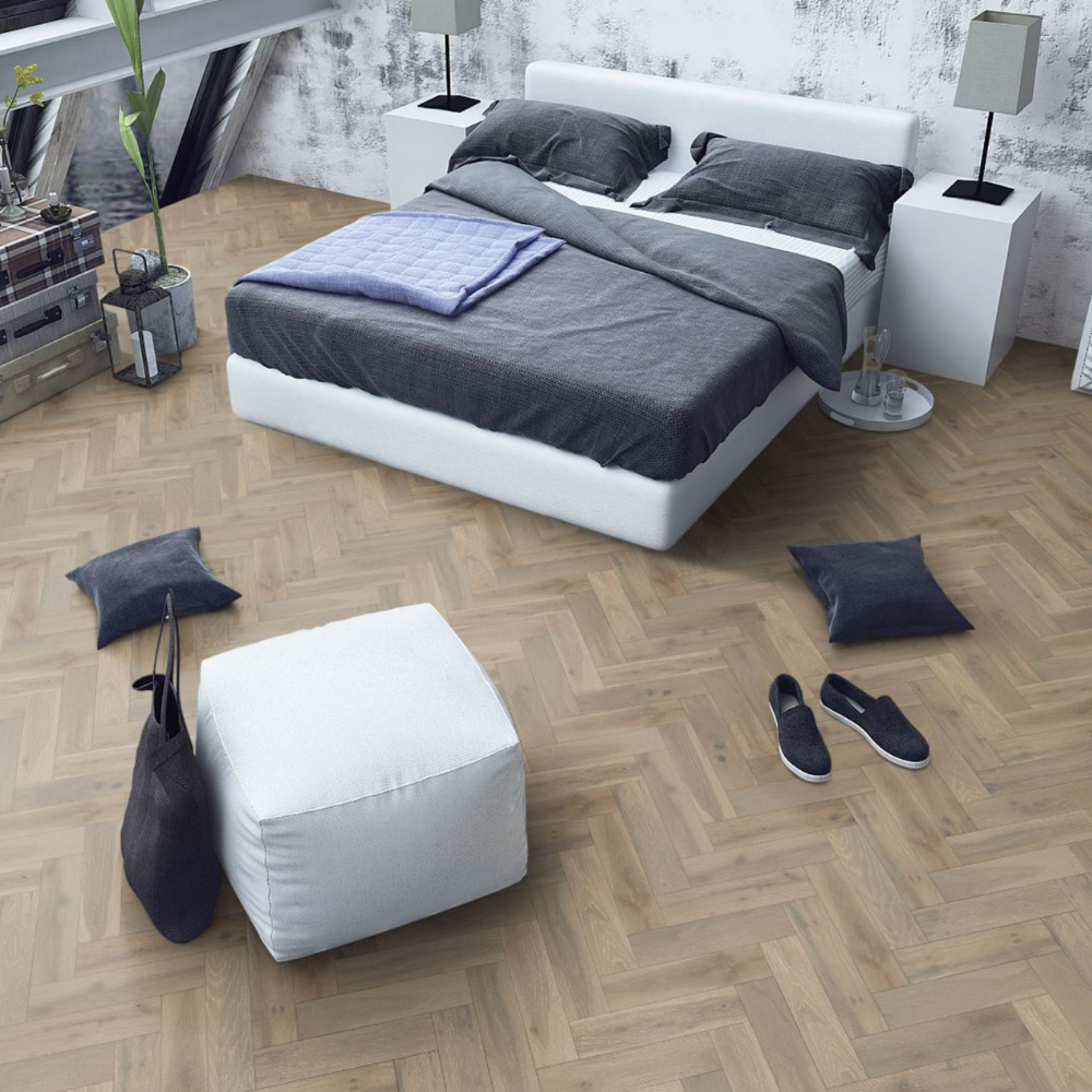 The Pearl Grey Oak Herringbone Engineered Flooring - 15mm features natural oak grains, multi layer stability and a brushed lacquer finish
