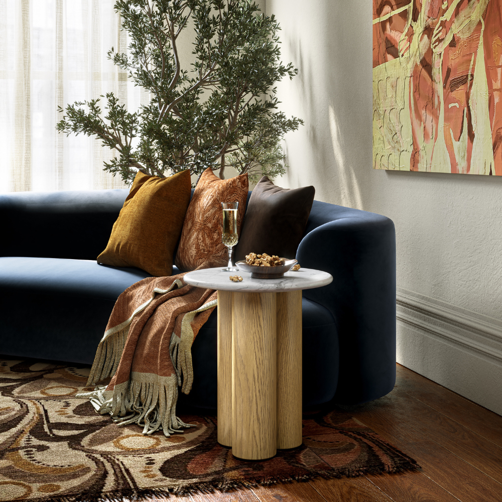 The Phoenix 3 Column Side Table features solid column legs and marble top, making this a stylish and versatile addition to any living space