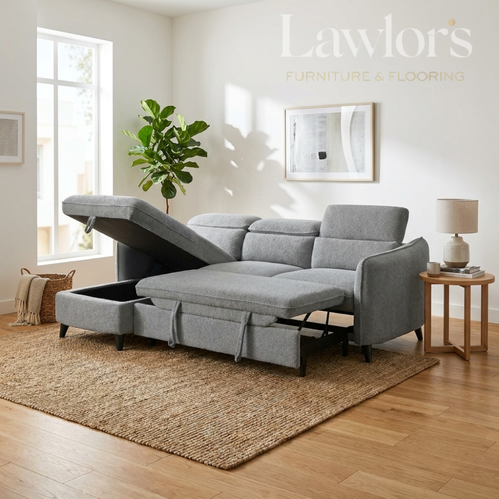 Gray sectional LHF sofa bed with storage drawers in a living room setting