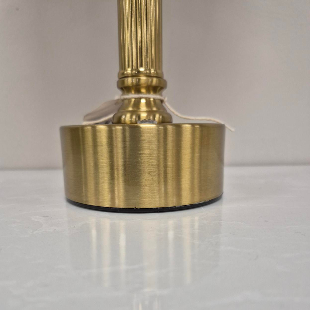 The Rechargeable LED Table Lamp 40cm offers RGBW colour, 3 light levels & tactile switch, an Antique Gold base & Linen Shade adding classic charm