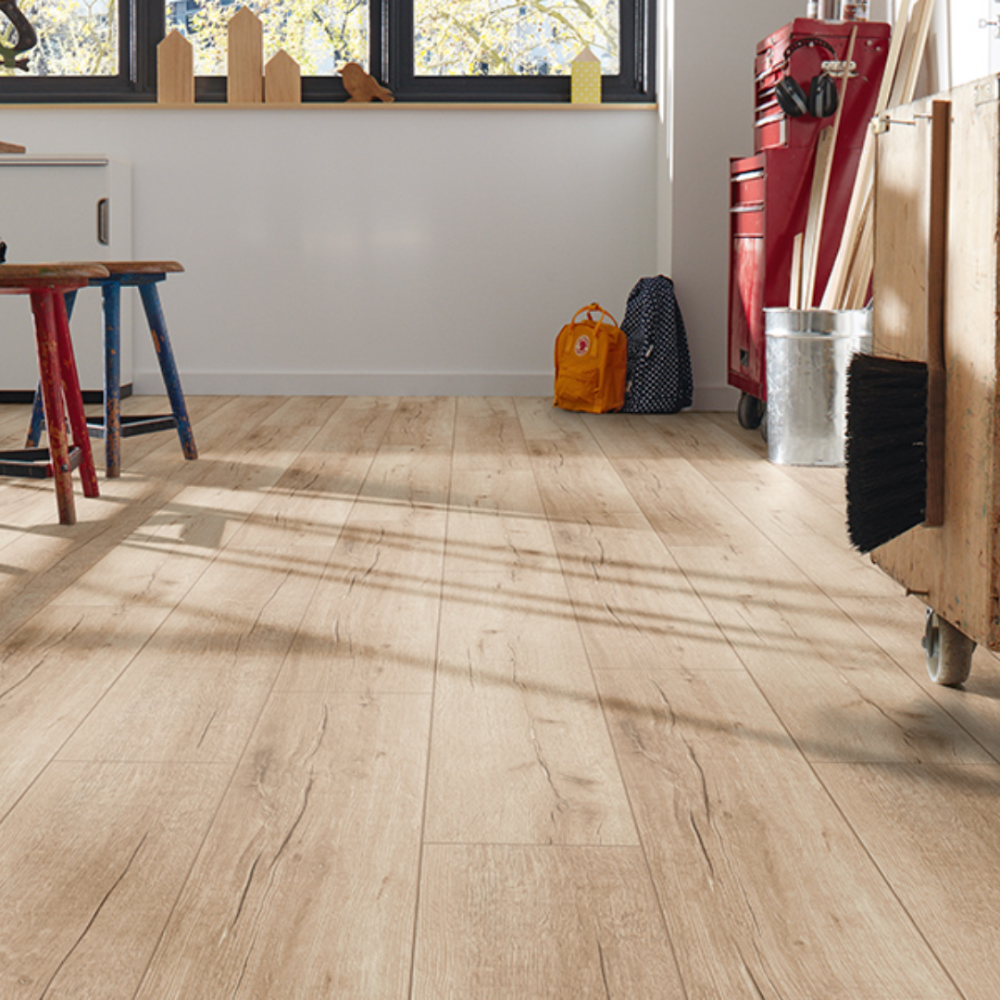 The Rip Natural Robusto Laminate Flooring - 12mm features AC5-rated, Matrix finish, beige-brown tone and 5G Click System.