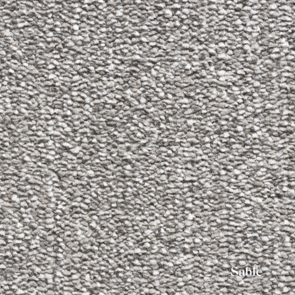Close-up of textured gray carpet with 'Sable' label