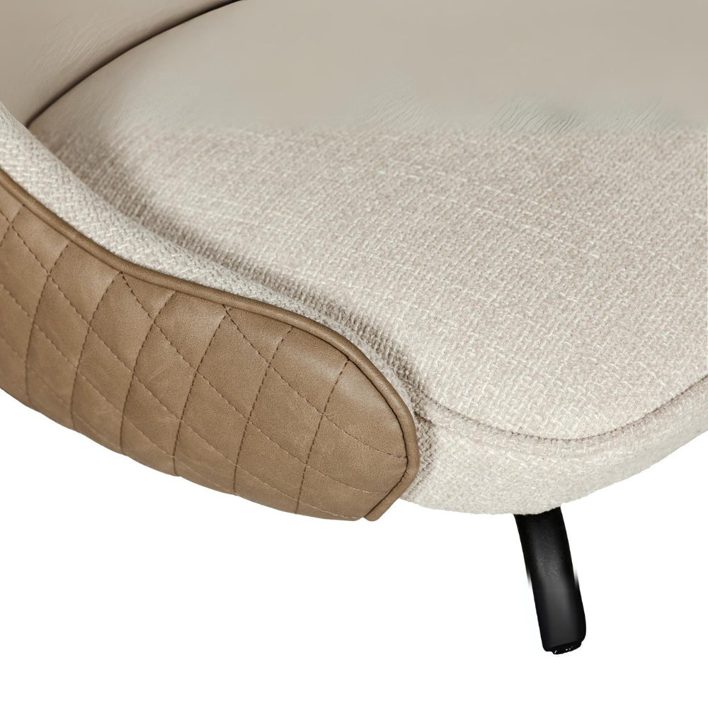 The Sadia Dining Chair in Biscuit features sleek black powder-coated metal legs for sturdy support and modern elegance.