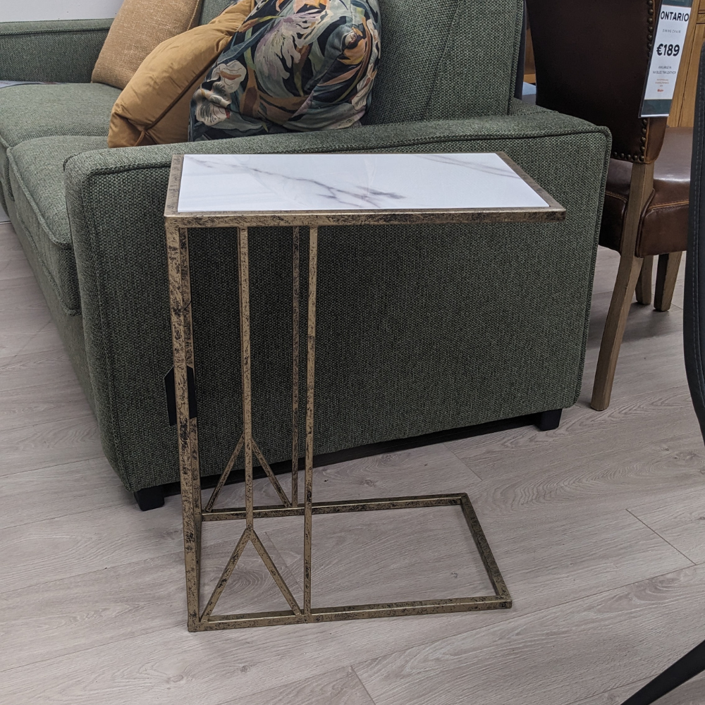 The Saloman Marble Top Accent Table features black and gold frame with a marble inspired top for a compact versatile piece, a timeless addition to any room