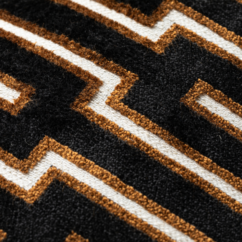 Scatter Box Cushion Harrison - 43x43cm, crafted in Ireland with premium fabric blend and feather filling. Bold black/cognac geometric design for modern luxury.