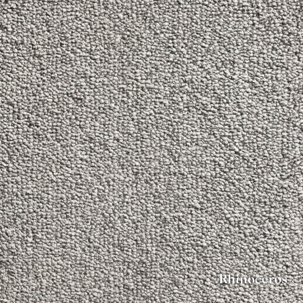 Close-up of gray carpet texture with 'Rhinoceros' branding.