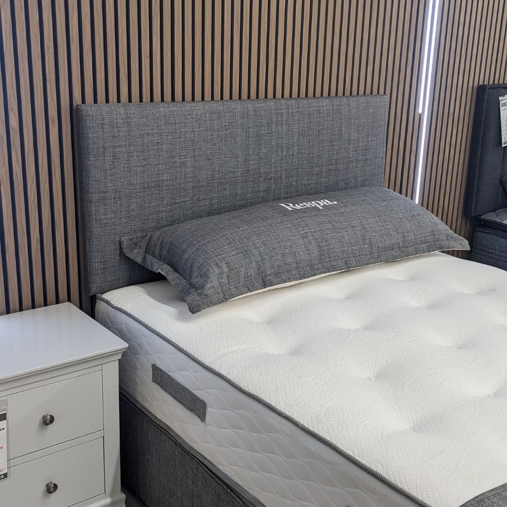 The Sleep Tight Headboard in Linen Steel features soft upholstery, plush padding and elegant Irish craftsmanship for timeless bedroom comfort