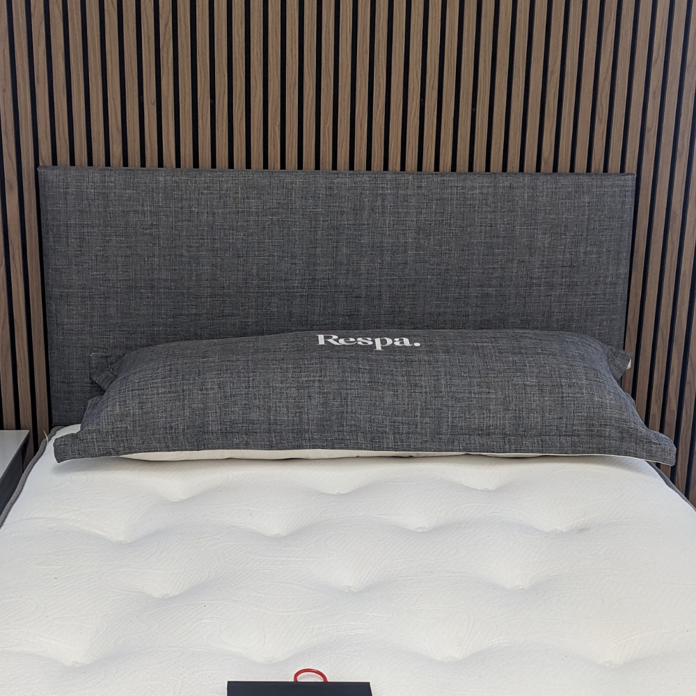 The Sleep Tight Headboard in Linen Steel features soft upholstery, plush padding and elegant Irish craftsmanship for timeless bedroom comfort