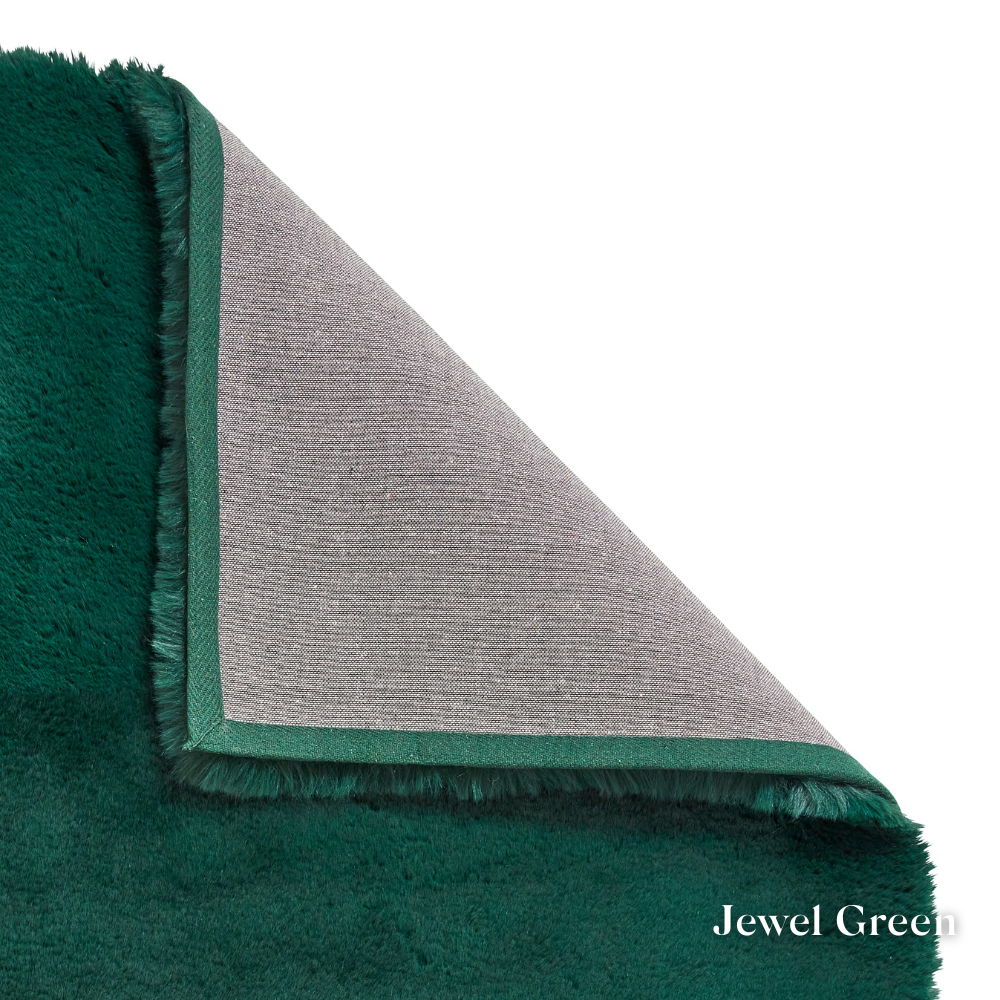 Elevate your space with the ultra-soft Super Teddy Plain Shaggy Table Tufted Rugs range featuring high quality polyester, durable and bold colour choices.