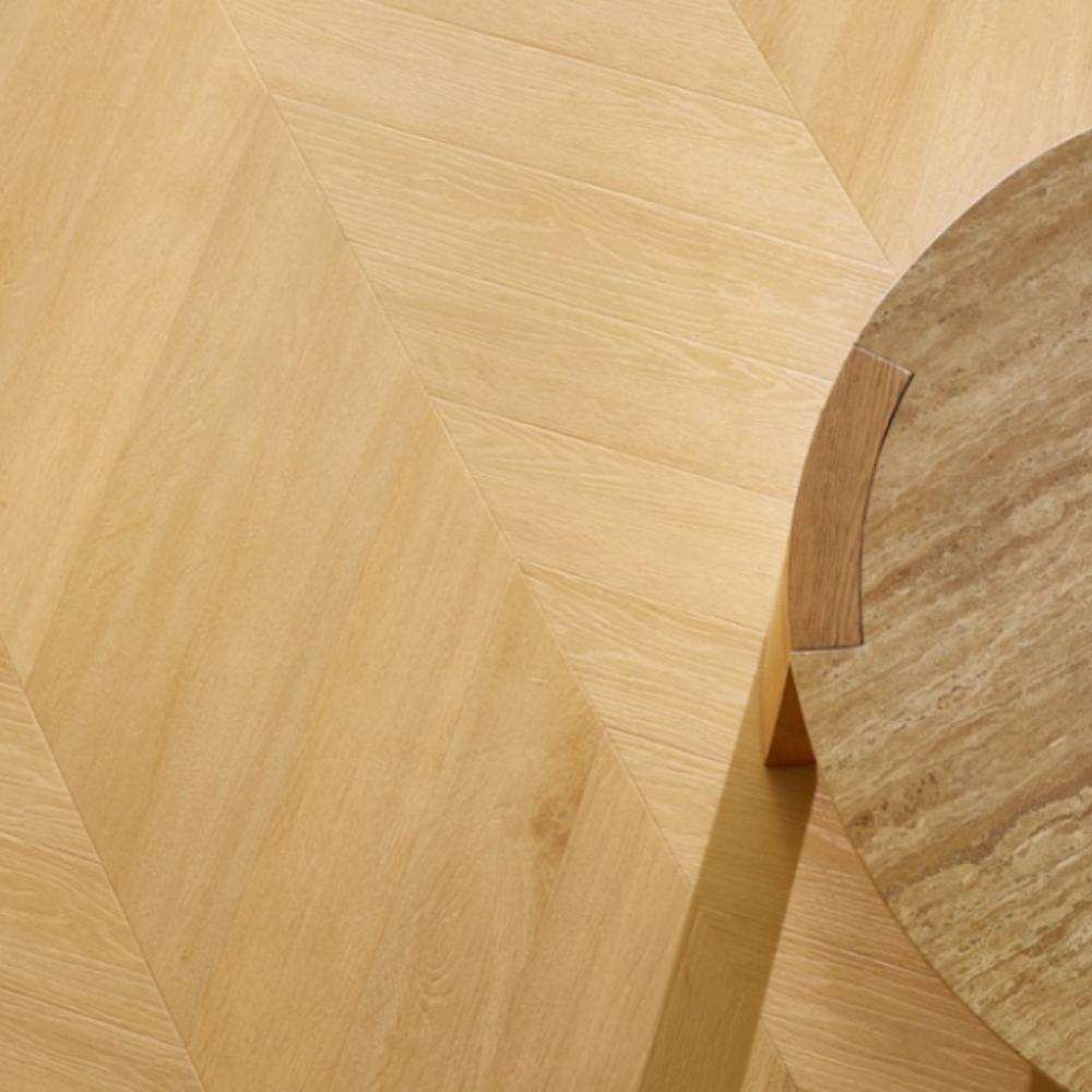 The Virgin Oak Chevron SPC Flooring features elegant chevron design, waterproof mineral core, 25 year warranty and Titanium Nano finish for durability