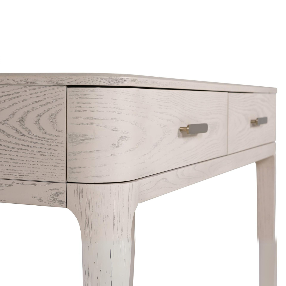 The Zahra Dressing Table with 2 Drawers in Parisian Cream features a refined oak finish and is perfect for storing essentials.