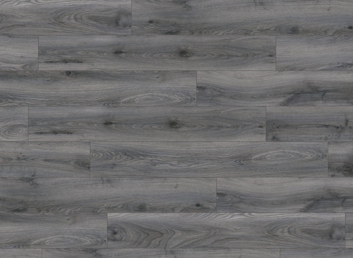 The Tomahawk Oak Laminate Flooring - 12mm features AC4 wear rating, antibacterial, realistic wood look, 20-year guarantee, underfloor heating compatible, Click2go locking system.