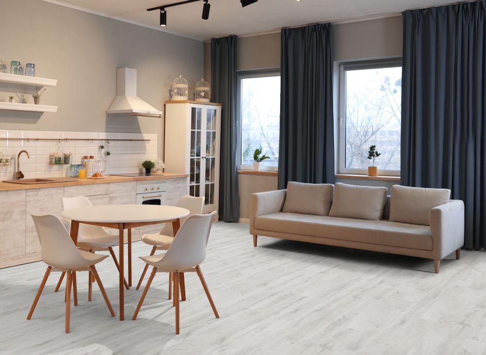The Fresco Snow Gloss Laminate Flooring – 8mm features high-gloss woodgrain, AC4 wear rating and underfloor heating compatible