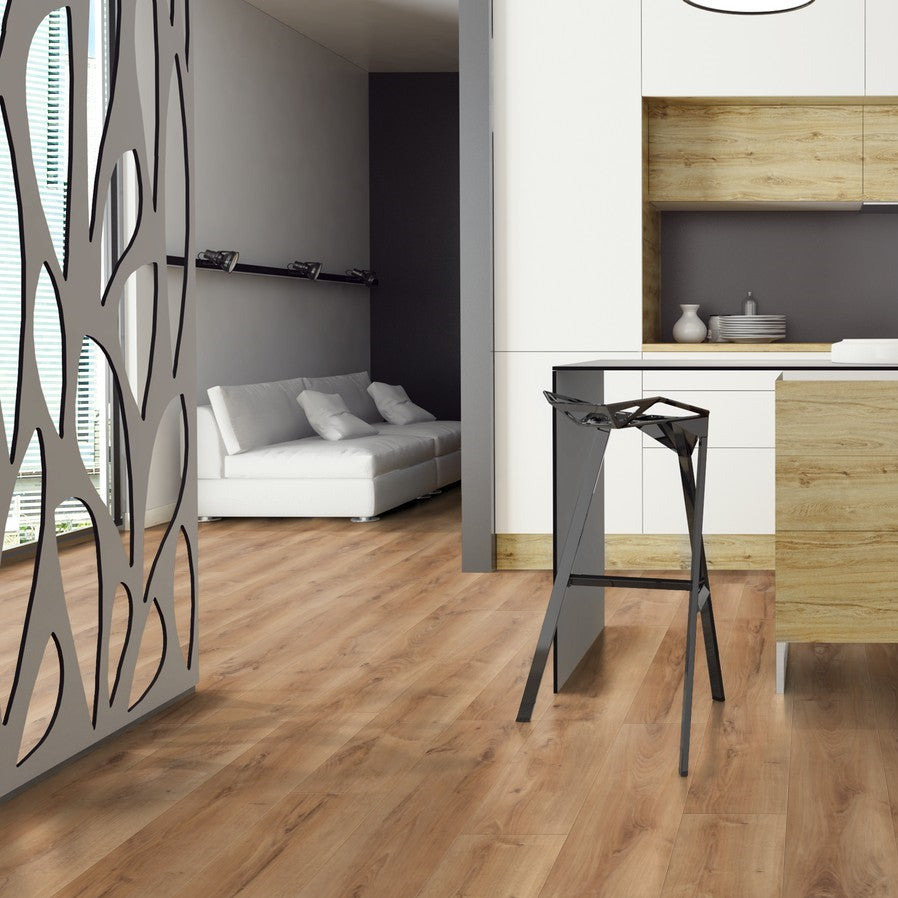 The Celtic Oak Laminate Flooring - 12mm features AC5-rated durability, warm brown tones and a 30-year warranty.