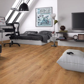 The Dublin Oak Laminate Flooring - 12mm has a warm brown tone, AC5 durability, and a 30-year warranty.