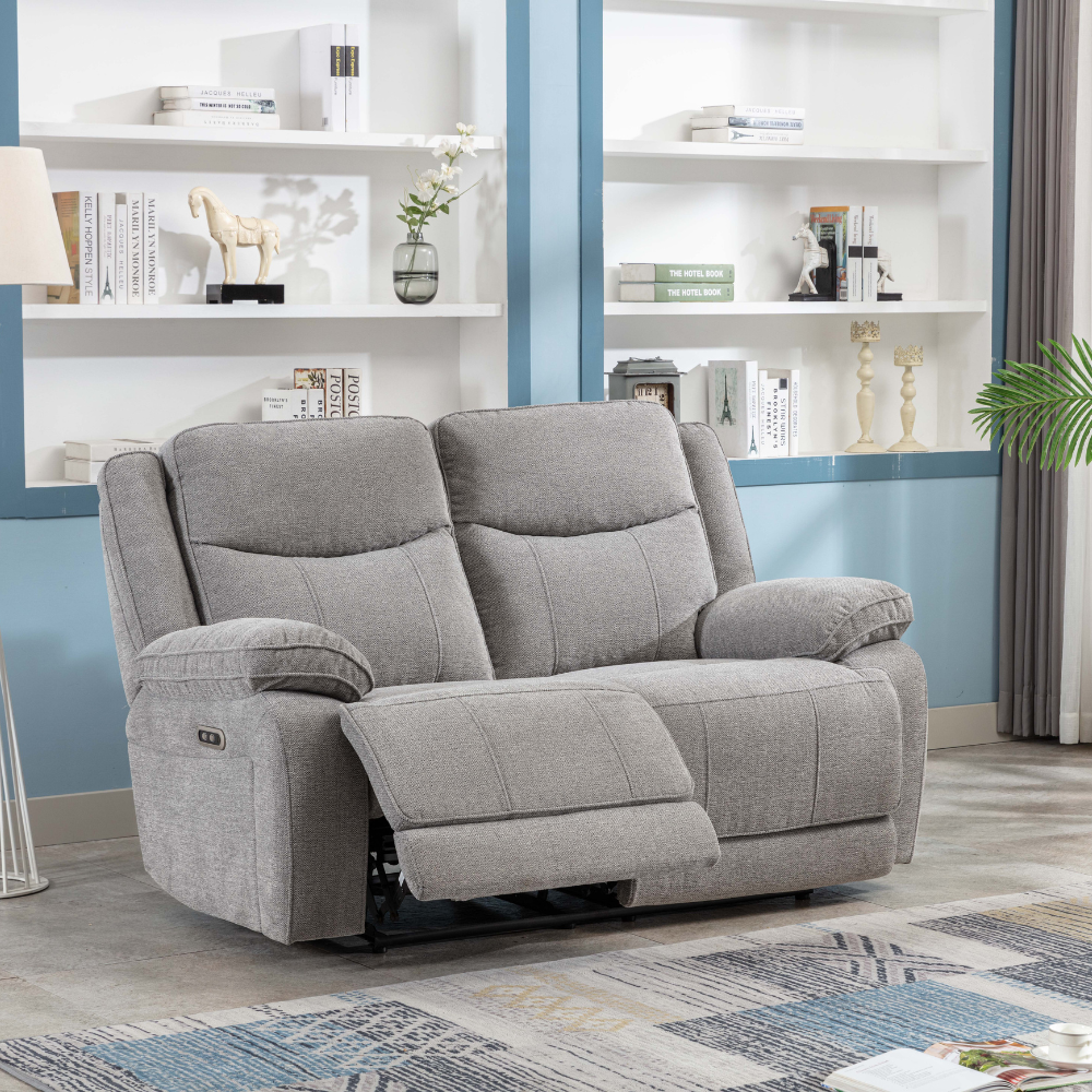 The Hayden Recliner Sofa Set in Light Grey is upholstered in light grey and premium materials, plush cushions and spacious seating