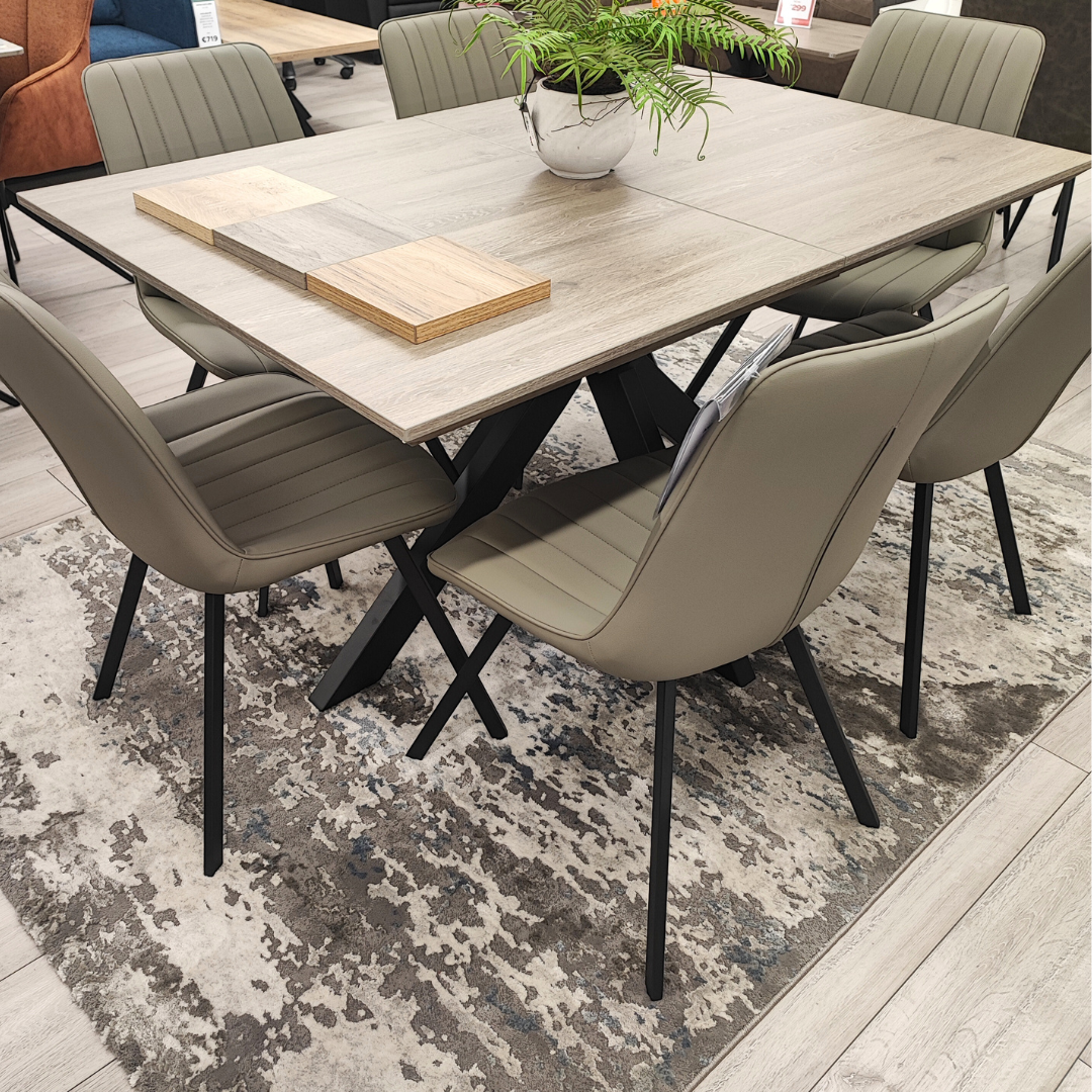 The Malin Grey Dining Set includes the Malin Fixed Dining Table and 6 Tan Miro Dining Chairs
