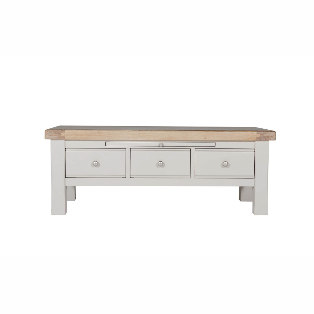 The Doune Coffee Table in Taupe features oak veneer top, three storage drawers with sleek handles and a versatile design.
