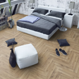 Enhance your space with Albany Oak Herringbone Laminate Flooring featuring an AC4 rating, underfloor heating compatible and easy-to-install choice.
