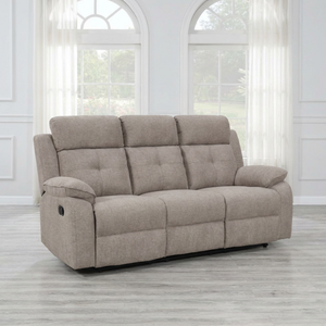 Light brown sofa in a room with large windows and white walls.