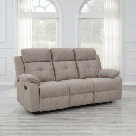 Light brown sofa in a room with large windows and white walls.